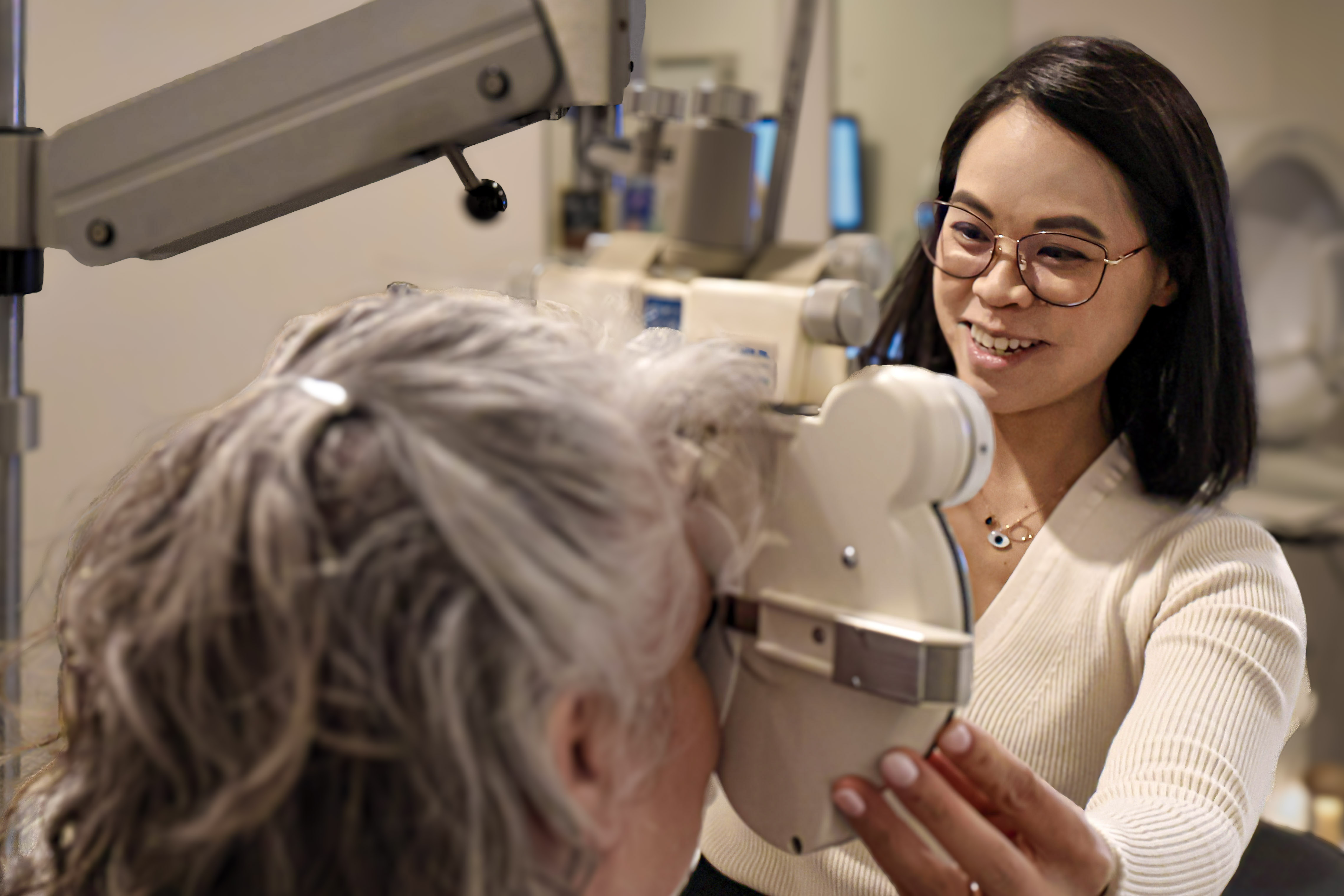 Dr. Sarah Fong performing a comprehensive eye exam at Boardwalk Eye Care in Cambridge