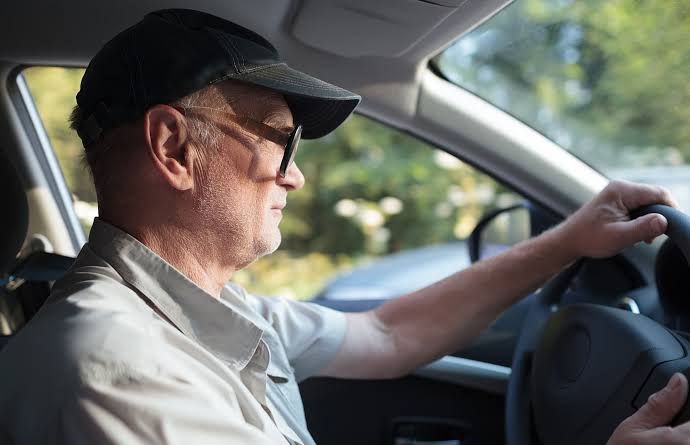 Senior driver at the wheel — the kind of driver who needs an MTO vision report